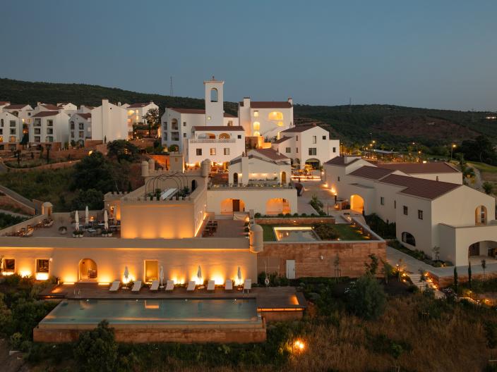 Aerial view of Viceroy Ombria Algarve Resort at dusk.