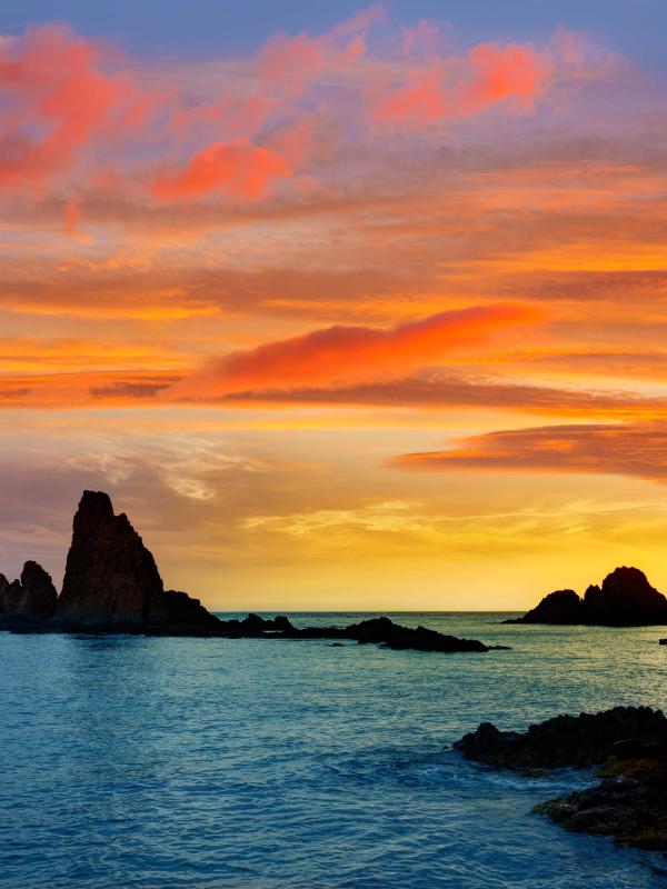 red and yellow sunset over the water