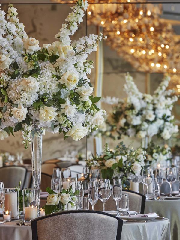 large floral centerpiece on a round table