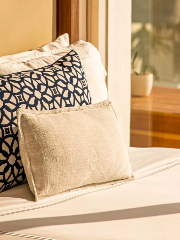 3 pillows on a bed in a suite at Viceroy Los Cabos