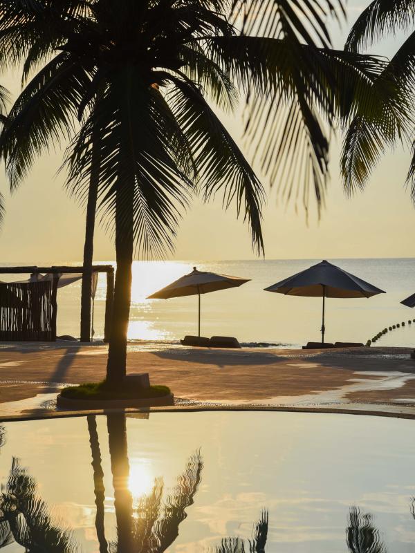 A sun set at a beach resort