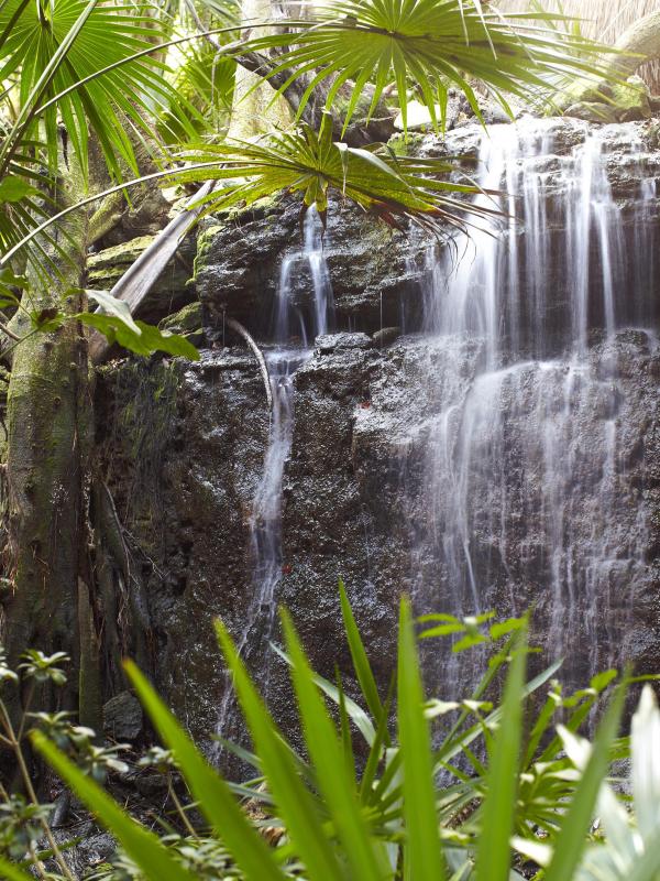 A rock waterfall near the Wayak Spa at Viceroy Riviera Maya