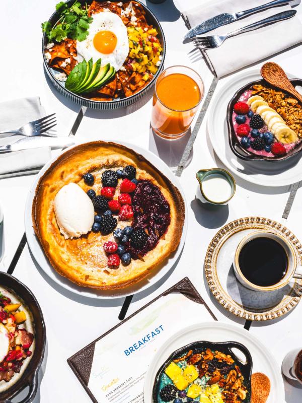 A spread of food offered by Viceroy Santa Monica