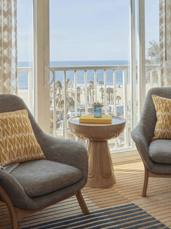 2 Chairs in a room by the balcony in a room at Viceroy Santa Monica