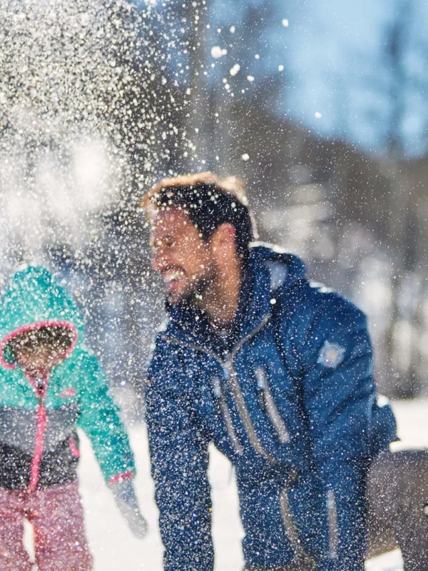A family playing in the snow at Viceroy Serbia