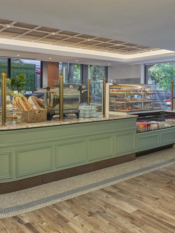 The bar at BPM Coffee & Wine and surrounding shelves with provisions