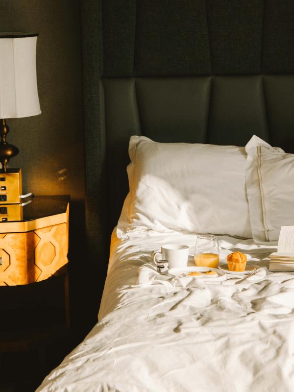 Breakfast on a bed in a room at Viceroy Washington DC