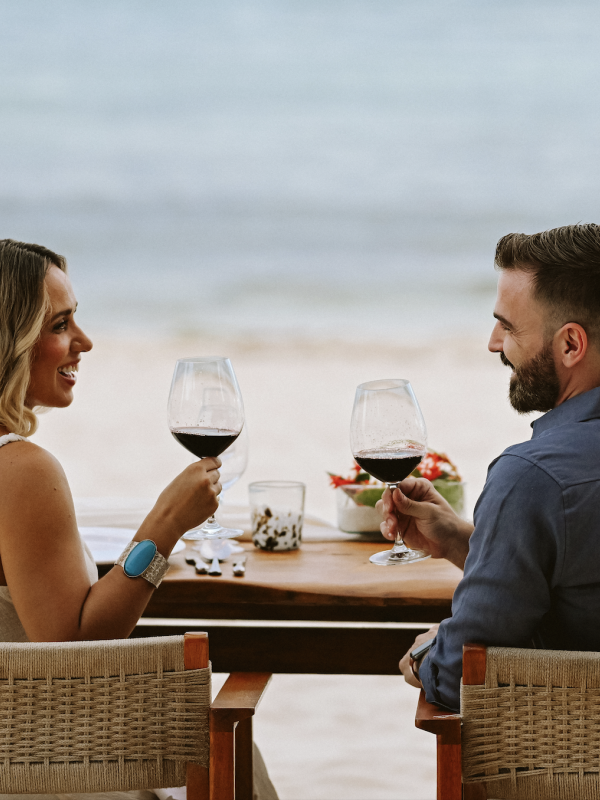 couple having dinner on beach