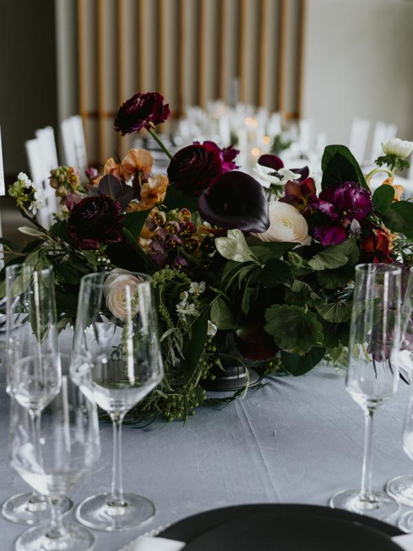 A beautifully decorated wedding guest table with a placement 