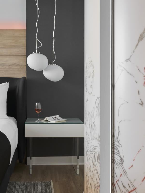 King Suite with illustrations on the shower panel