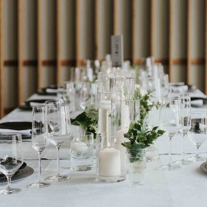 A banquet table set up for a wedding.