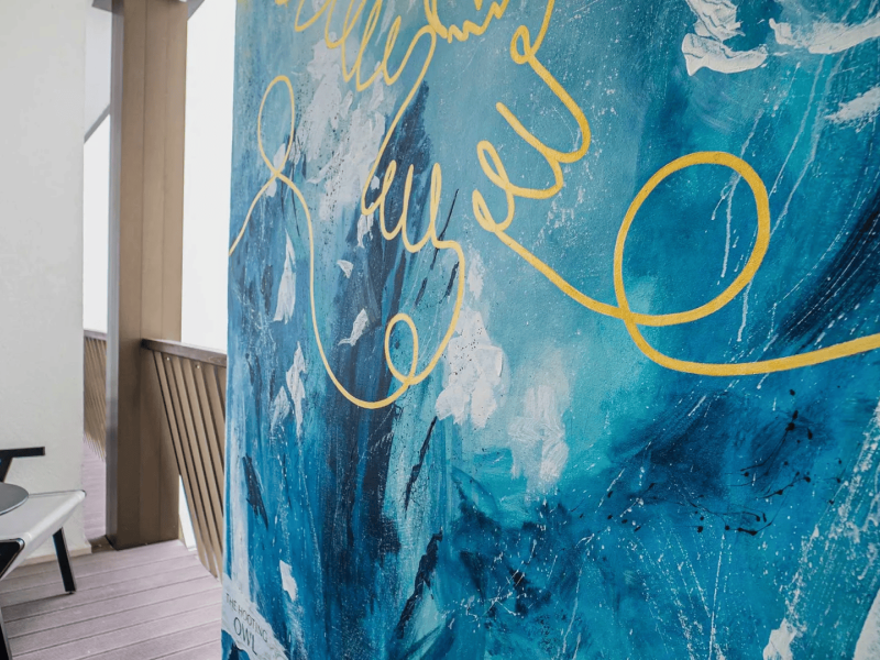A large piece of canvas abstract art on a balcony at Viceroy Nopaonik Serbia