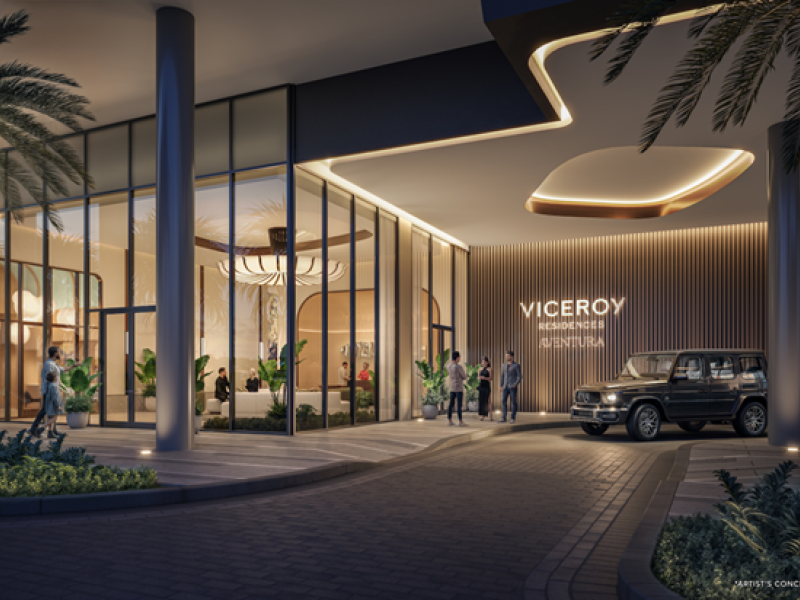 The entrance to Viceroy residences Australia, an art deco-style building with a large driveway