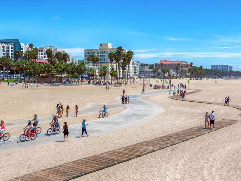 Cyclists and walkers on Santa Monica beach